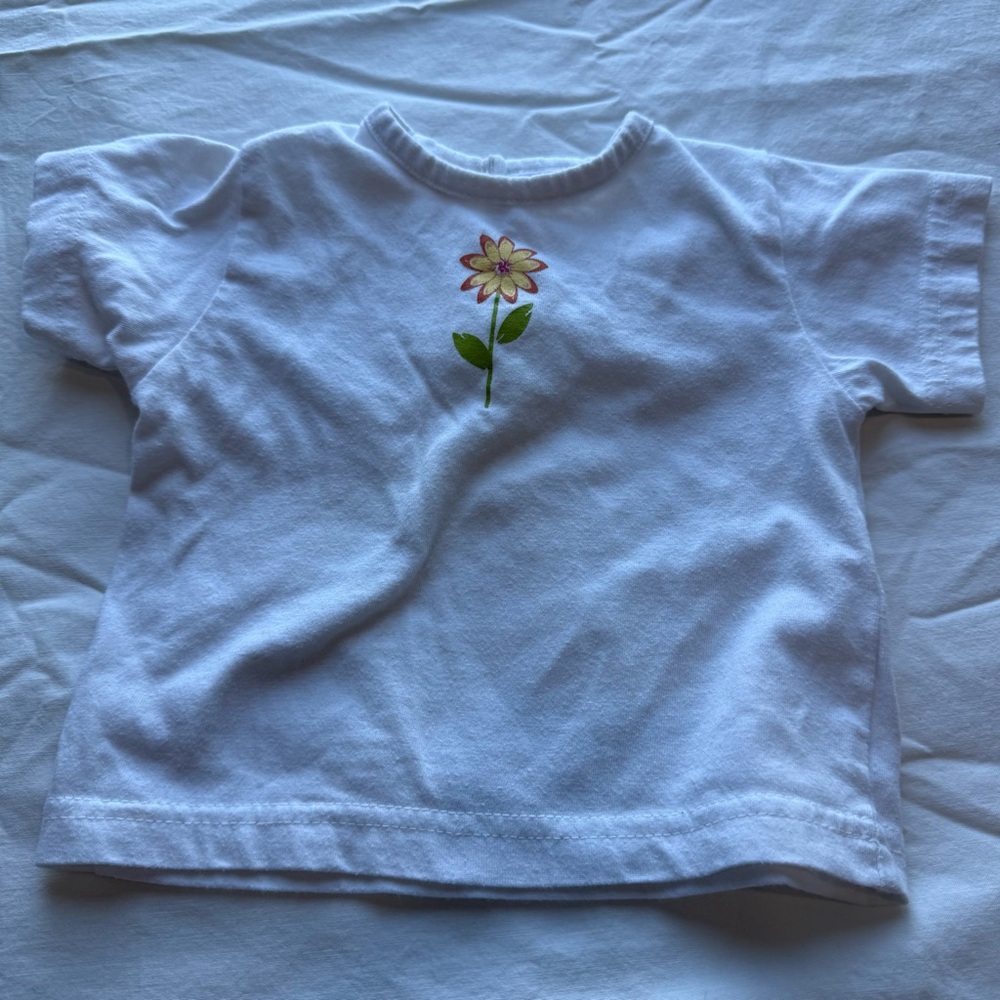 Charming White Kids' Tee with Floral Accent